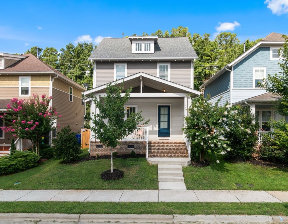 Craftsman home with new gray architectural shingle roof, street view